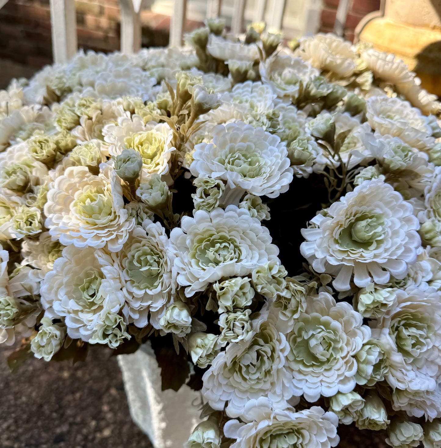 Faux white mum pot filler.