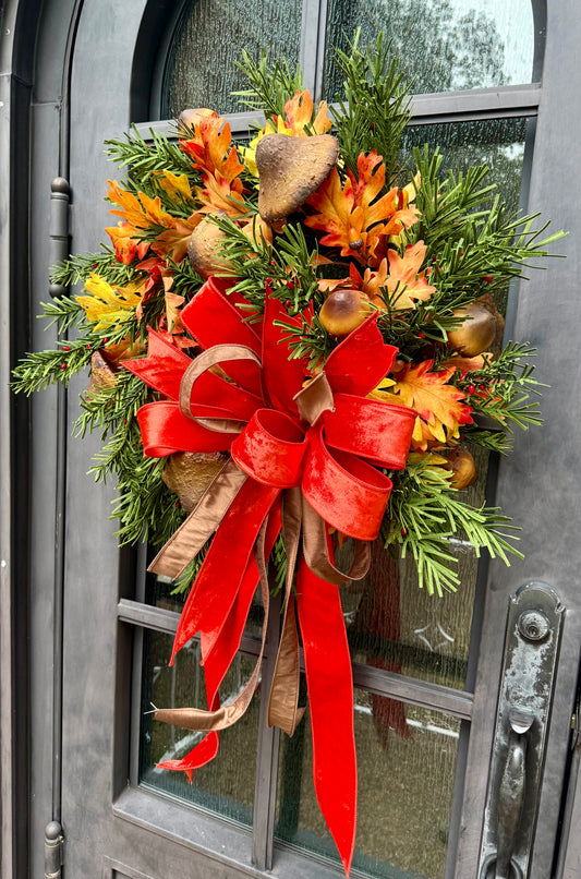 Mushrooms for fall! JME handmade wreath with a JME hand, tied orange velvet bow. About 24 inches wide.