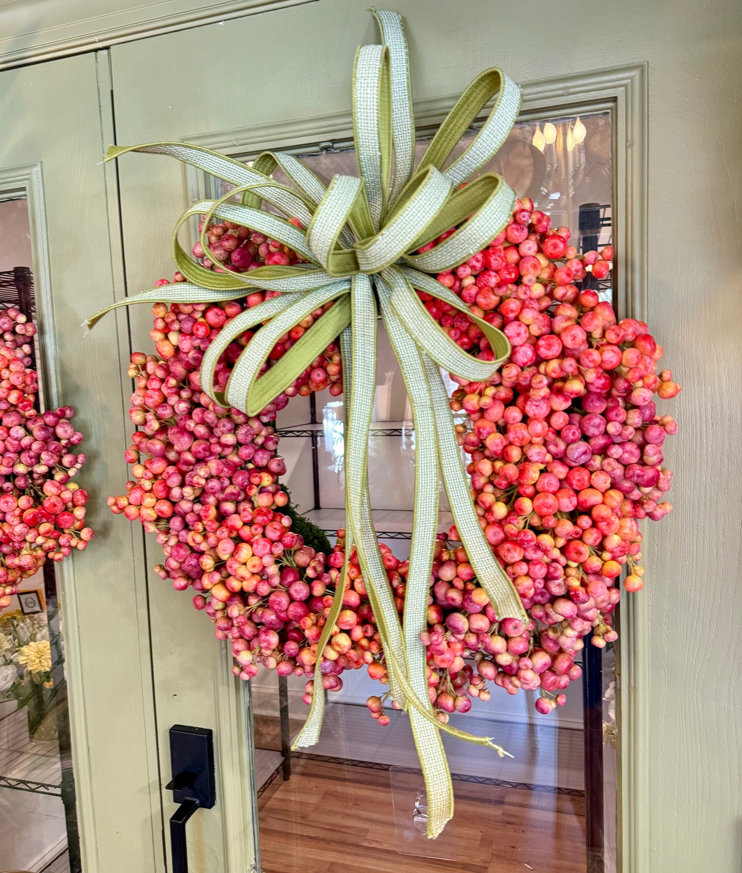Hand made crabapple wreath with JME hand tied bow. About 24 inches wide.