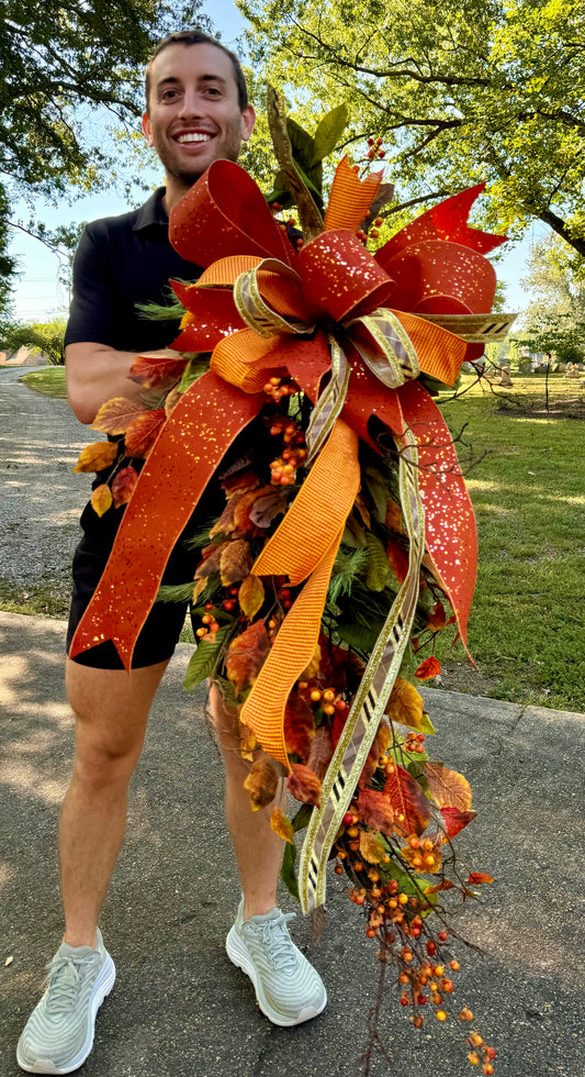 Fall door swag—orange tones.