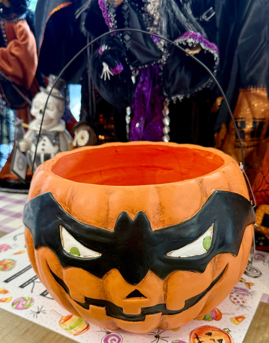 Vintage Halloween candy ￼bucket. 10 inches jack-o’-lantern wearing￼ a bat mask.