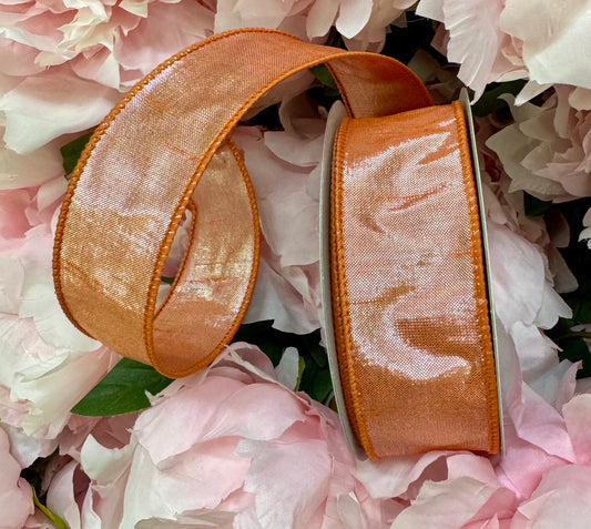 Metallic metal orange/Salmon color. Wire ribbon. 1.5” x 10 yards.