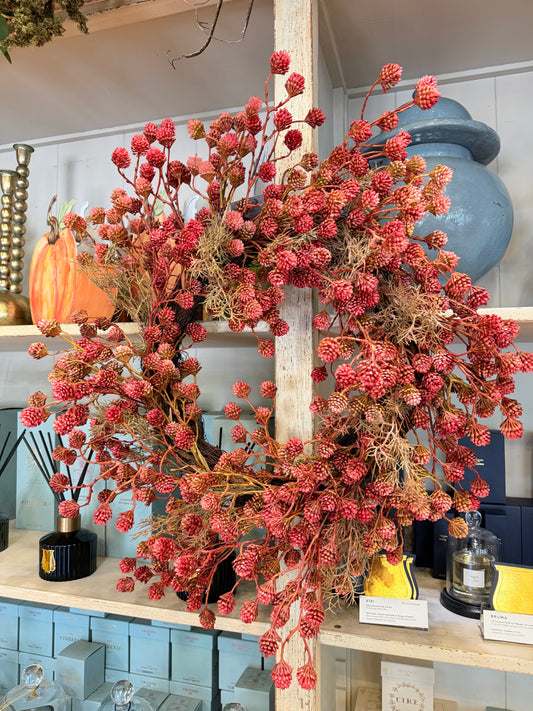 Faux Pod wreath in red/Burgundy. About 26inches in diameter.