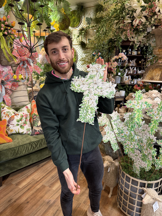 Metal Cross with WHITE flowers. Comes with a hook and removable stake. Perfect for the yard, a planter, a wreath or to display. Indoor/Outdoor use. Cross size: 16 inches