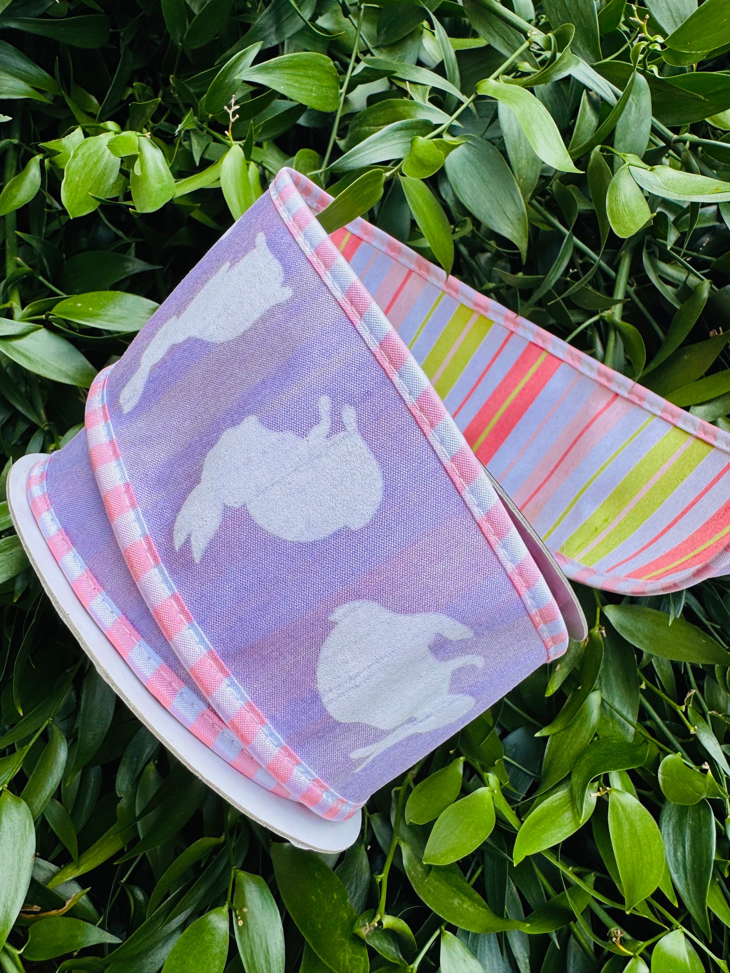 JME heavy wired ribbon. Lavender Bunnies with Pink/White Trim and Pink/Lime Striped Back 2.5"x 10YDS