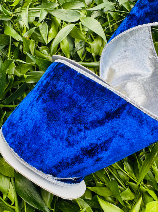 JME heavy wired ribbon. Blue velvet with Silver metallic back. 4” x 10 yards.