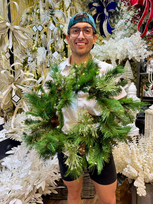 LED Lit 24" Wreath. Battery operated. Requires 3 AA batteries.